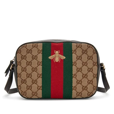 gold gucci camera bag